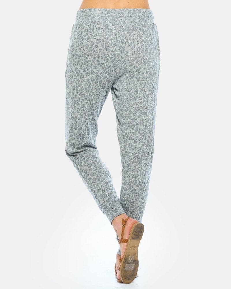 https://www.spiritjersey.com/cdn/shop/products/womens-cropped-brushed-printed-lounge-jogger-charcoal-leopard-566297.jpg?v=1700894000&width=800